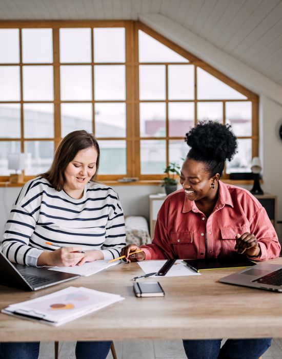 Two professional plus-sized people working together